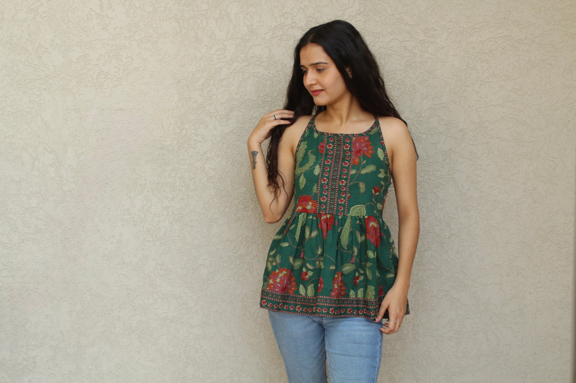 Sleeveless Peplum Top