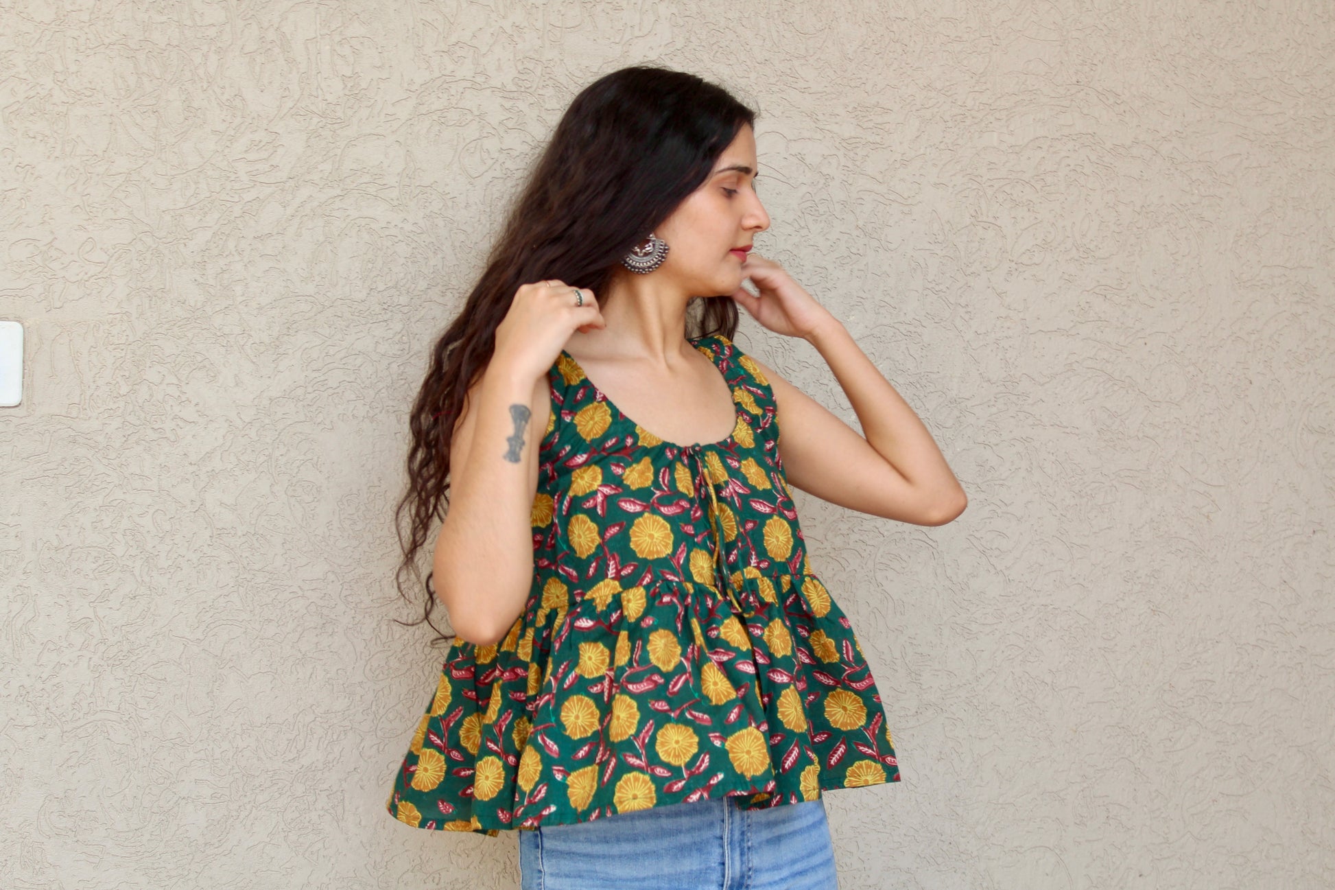 Sleeveless Peplum Tie-Front Top