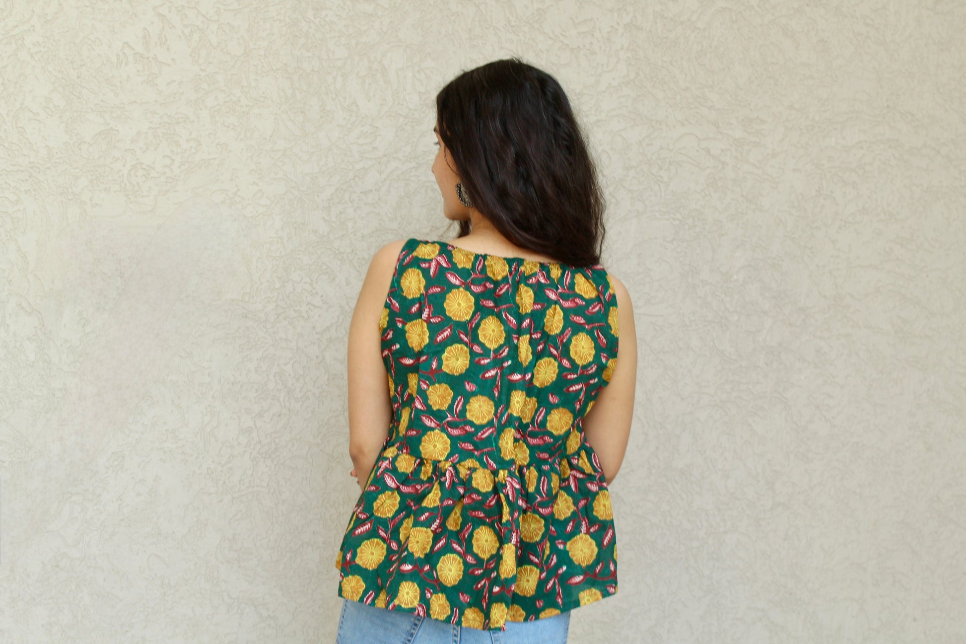 Sleeveless Peplum Tie-Front Top